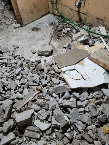 Shower Base Removal to Prepare for Wheelchair Accessibility