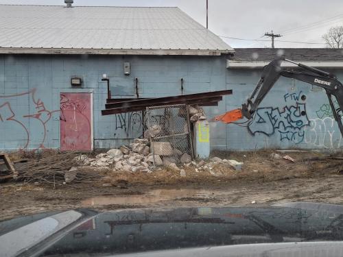 Removal of Concrete Structure Near Side Entrance